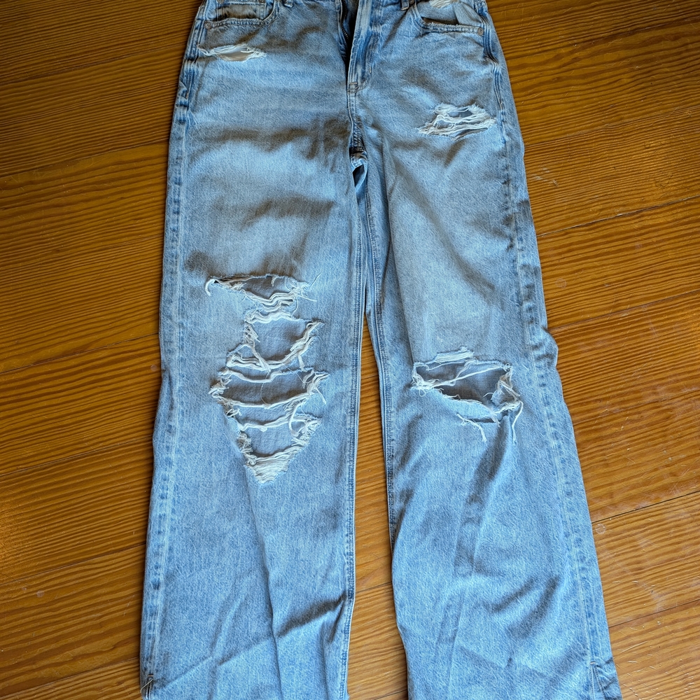 Distressed Light Blue Jeans
